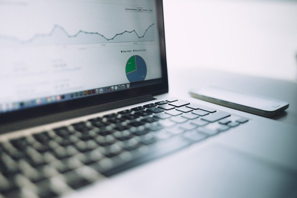 5 Questions To Ask That Salesperson Before Signing A Digital Marketing Contract 2 Laptop with analytics dashboard report on the screen